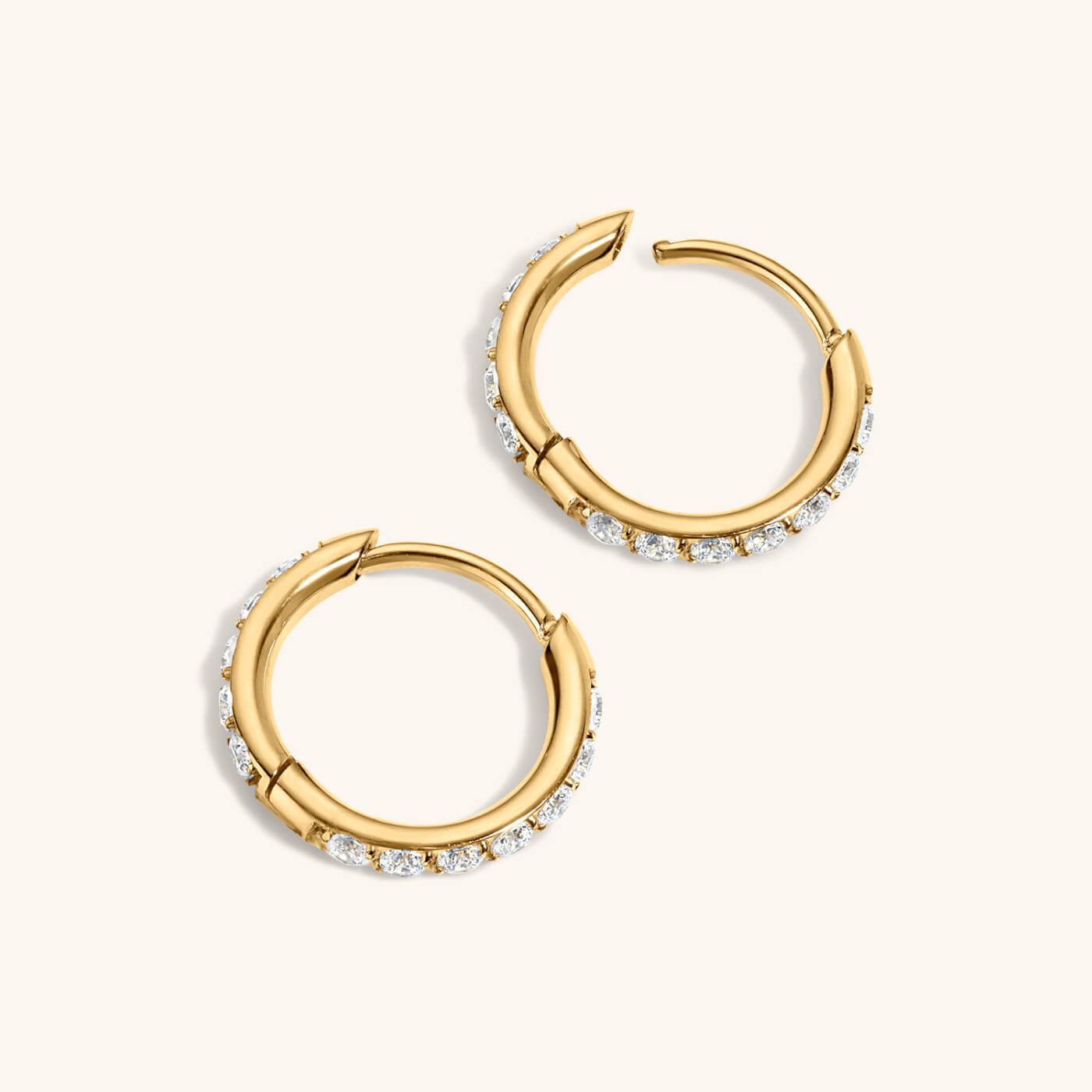 Everyday Hoop Duo in titanium (gold) with mini eternity hoops in titanium (gold)