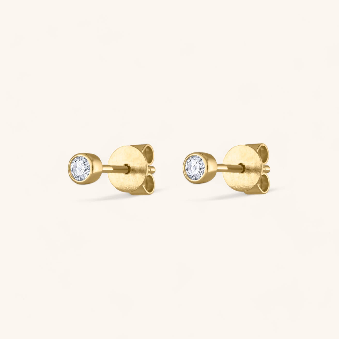 Tiny Diamond Studs in 14K Gold