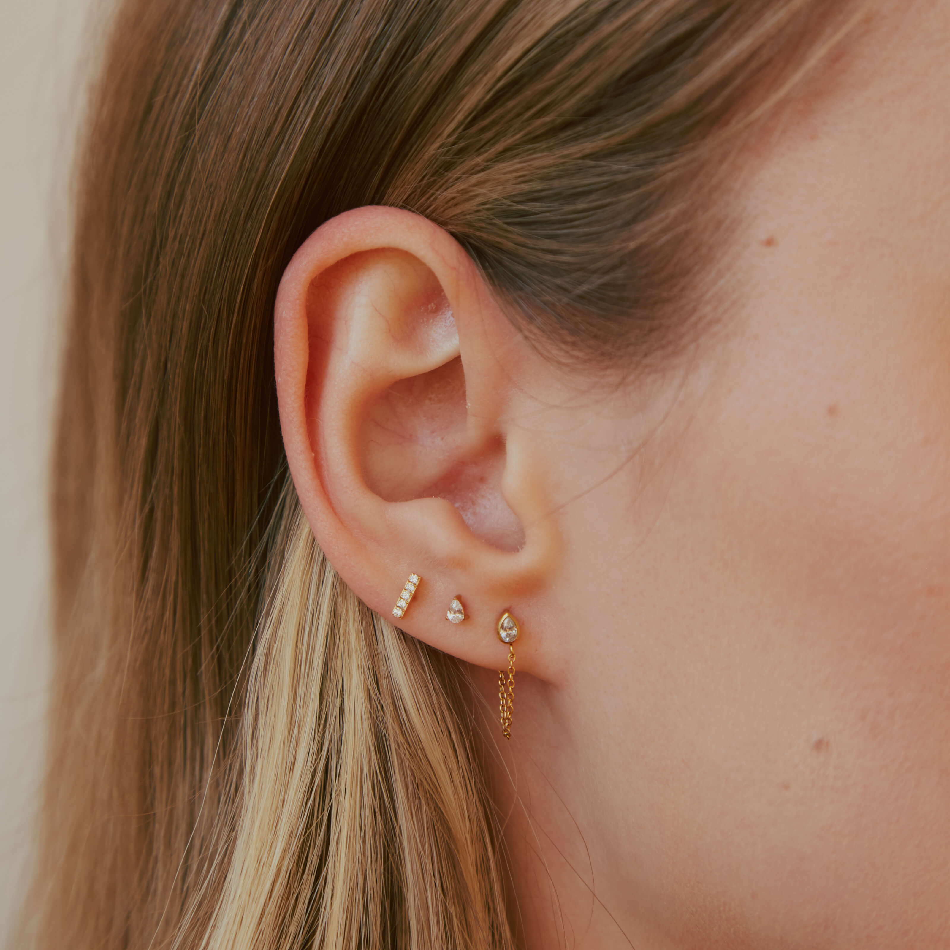 Iconic Nap Earrings Trio (Gold) on model