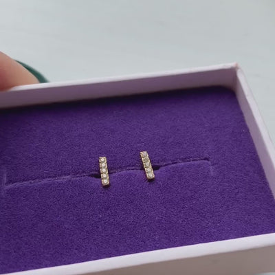 Pave Bar Studs in Titanium (Gold) on model video