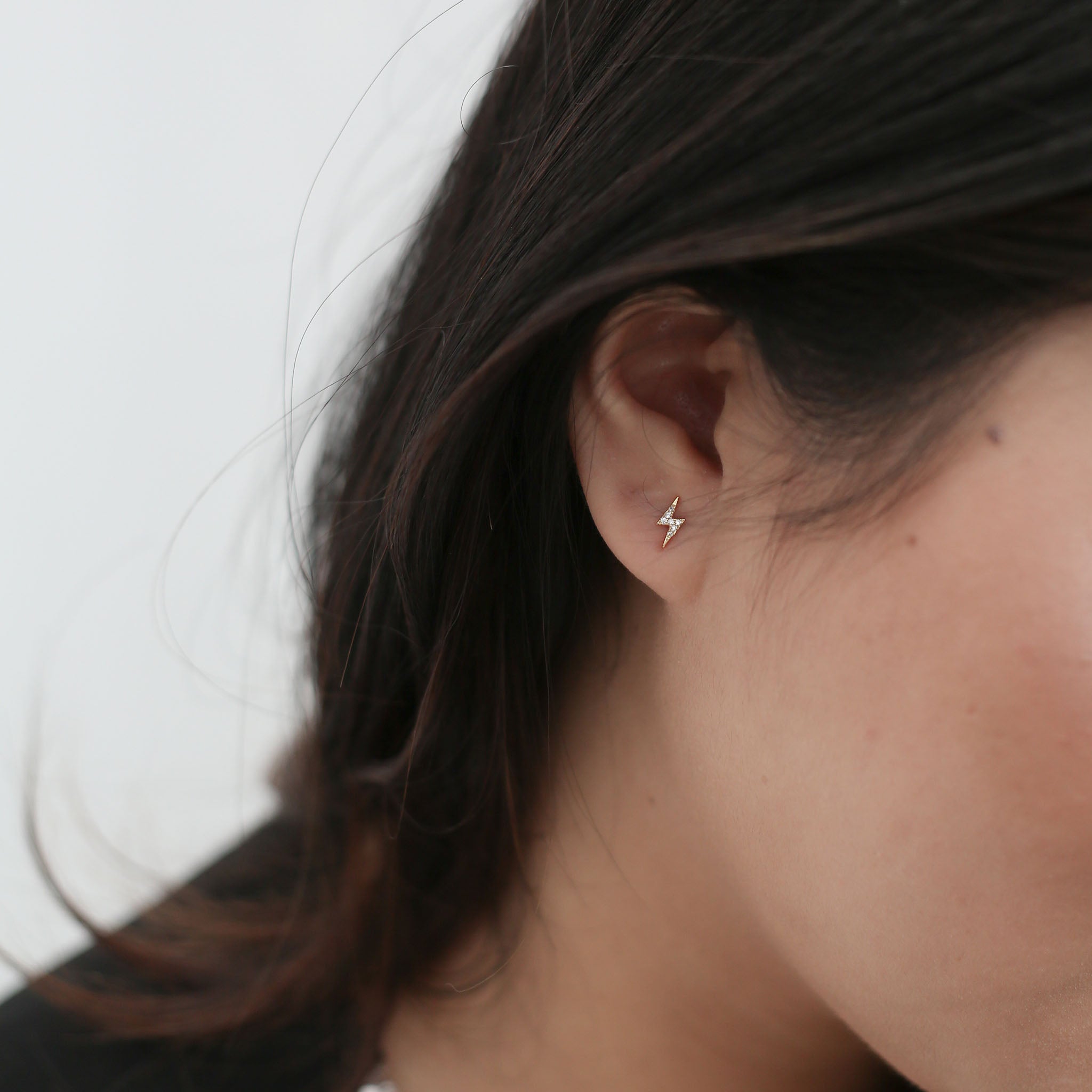 Pave Lightning Studs in 14k Gold on model